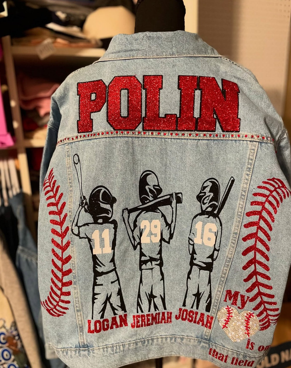 Custom bedazzled denim baseball jacket with three sons names and numbers