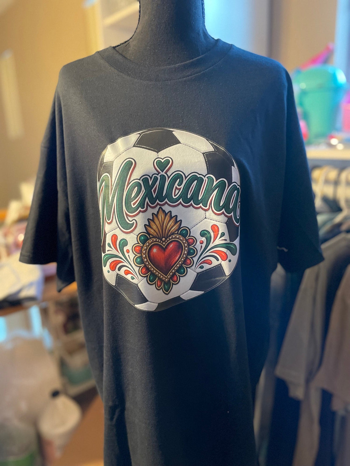 Black custom t-shirt with an original Mexicana soccer ball and sacred heart design